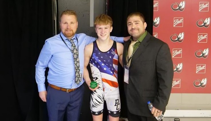 Griffin Rial, 5A State Champion (120), with his dad and Coach Billy Gabel